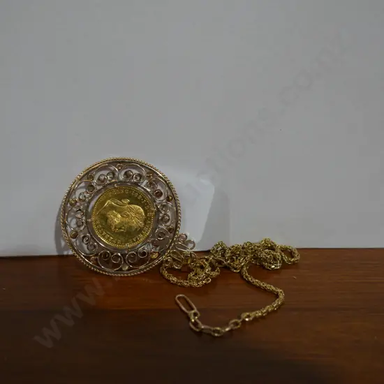 Gold pendant coin