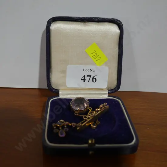 Gold and amethyst brooch