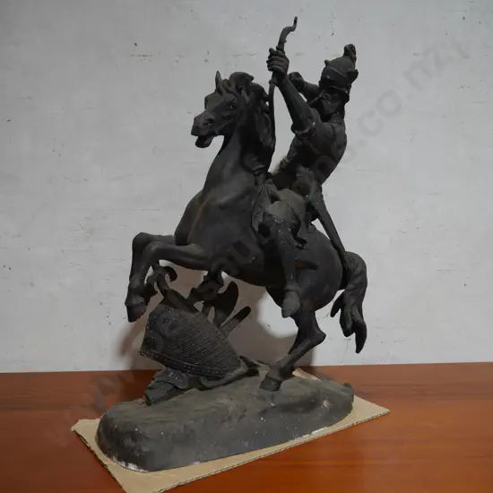 Metal horse and rider