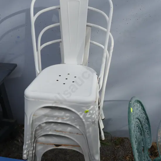 4 white metal chairs