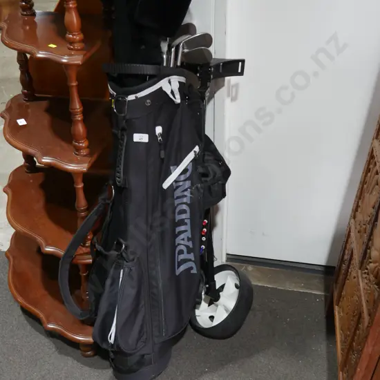 Golf trundler and clubs