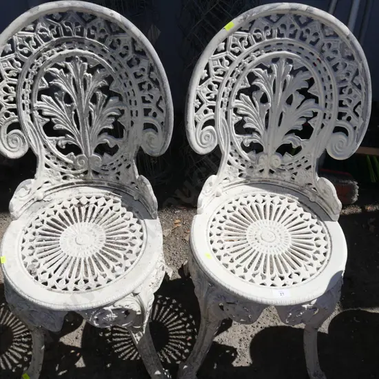 2 Wrought iron chairs