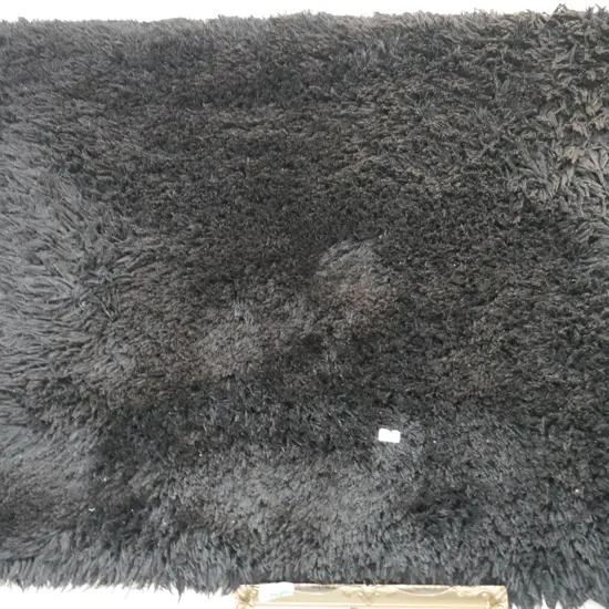 Black floor rug