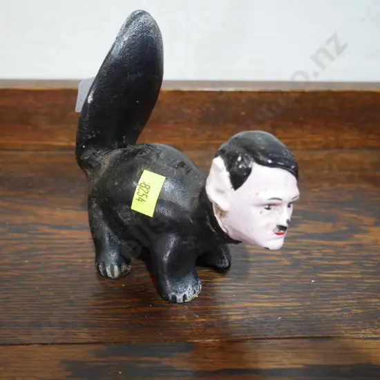 Anti Hitler cast iron skunk