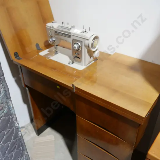 Sewing machine and table
