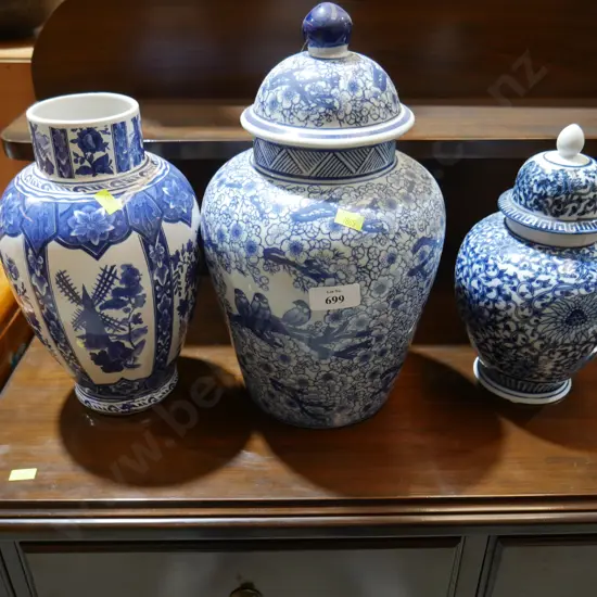3 blue and white jars