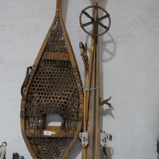 Vintage wooden snow shoes and skies