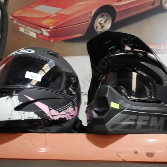 2 motorbike helmets