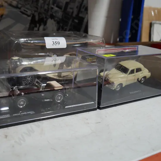 3 vintage model cars