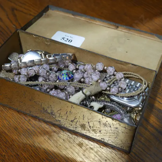 Tin of jewellery