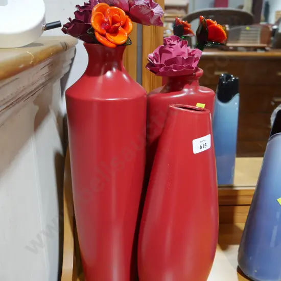 3 red modern vases