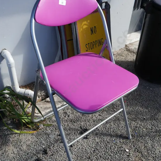 Pink folding chair