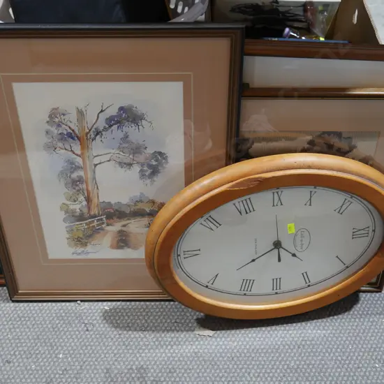 Framed artworks, clock
