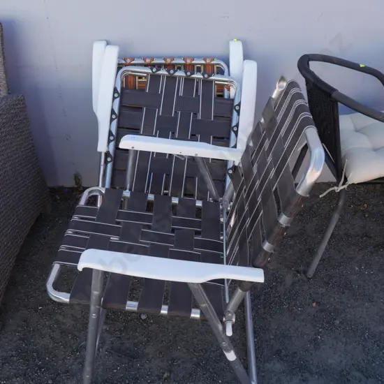 Four folding camp chairs