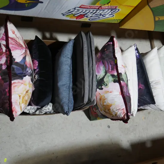 Two boxes of cushions