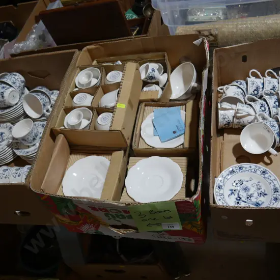 Three boxes of blue and white china