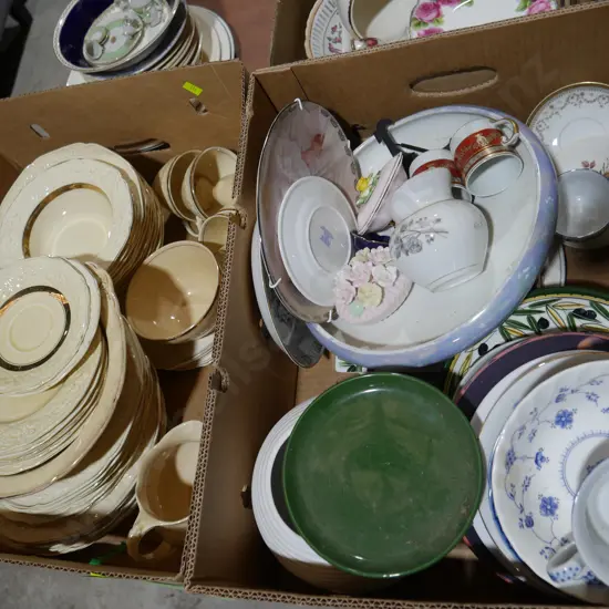 Two boxes of plates, bowls etc