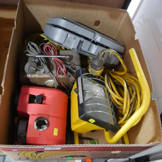 Work light, battery charger, drill sharpener