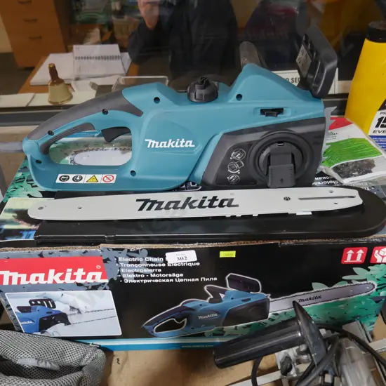 Makita electric chainsaw - new