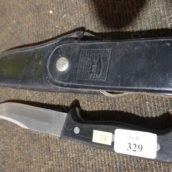 Knife and leather cover