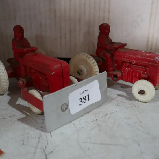 Two red fun ho tractors