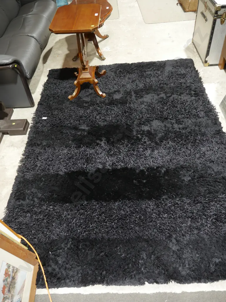 Black shaggy floor rug Image 1++