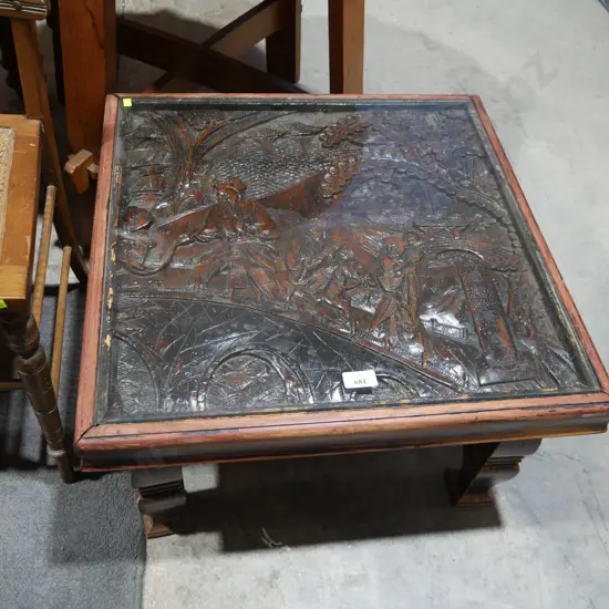Oriental carved glass top coffee table