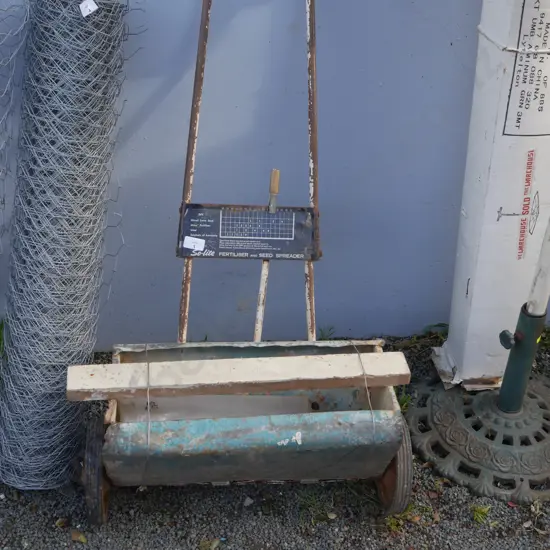 Seed and fertiliser spreader