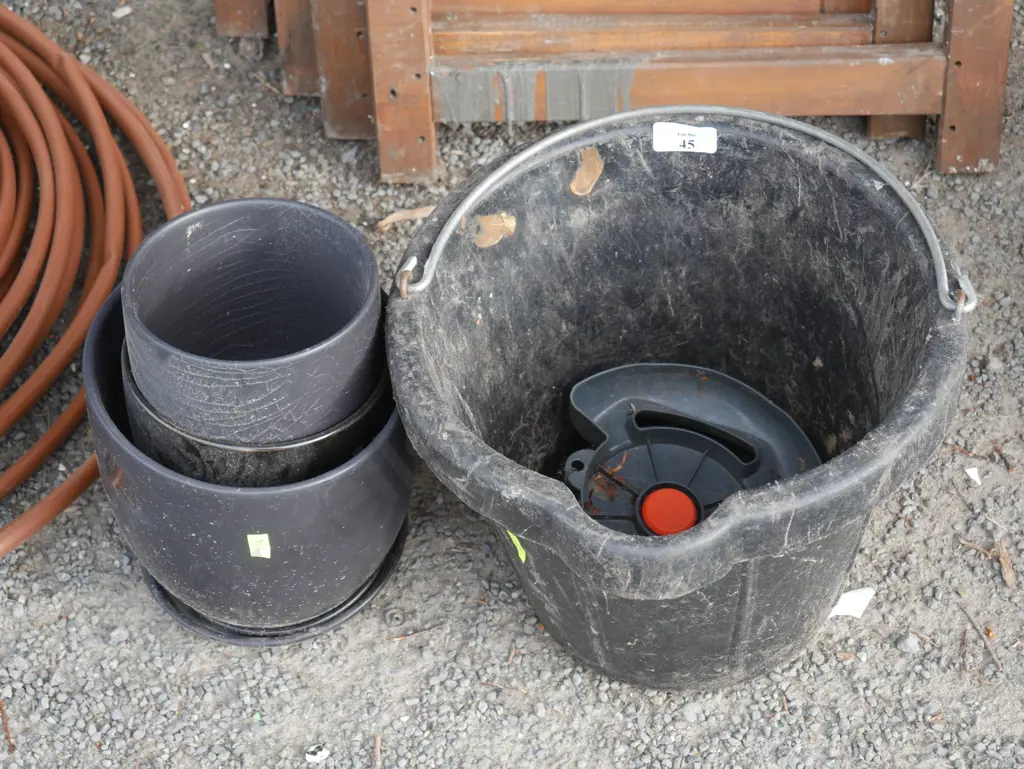Black plant pots and bucket Image 1++