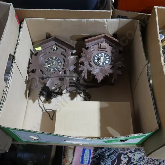2 cuckoo clocks