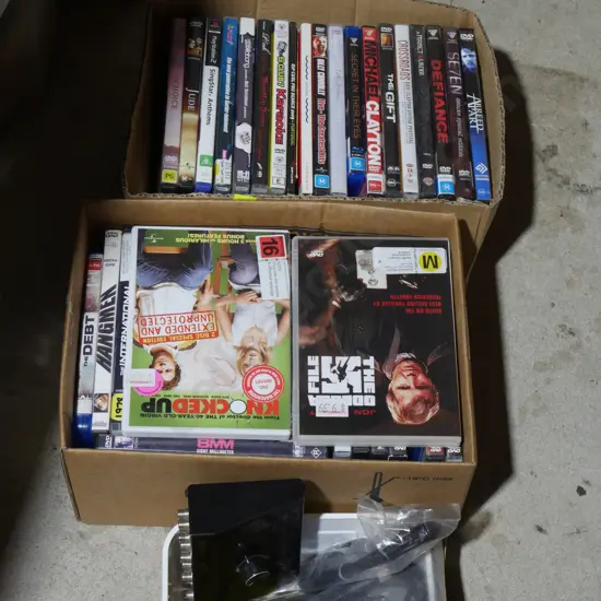 Two boxes DVDs etc