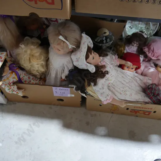 Two boxes of assorted dolls