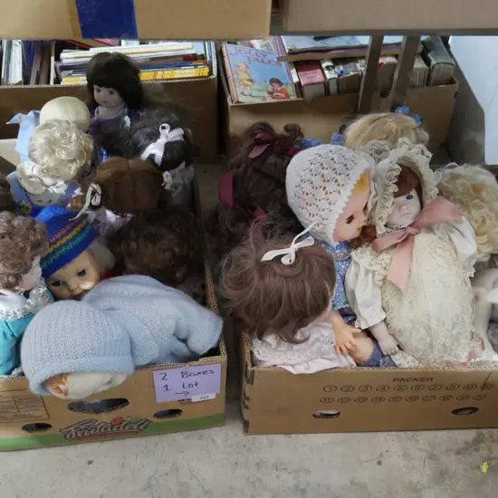 Two boxes of assorted dolls