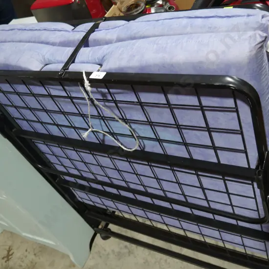 Portable folding bed