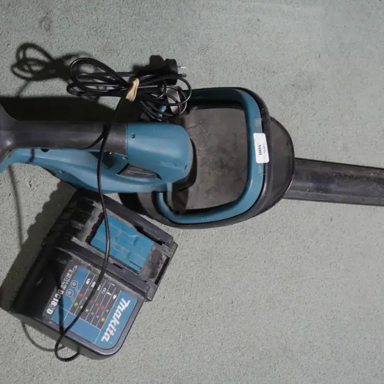 Makita hedge trimmer and charger