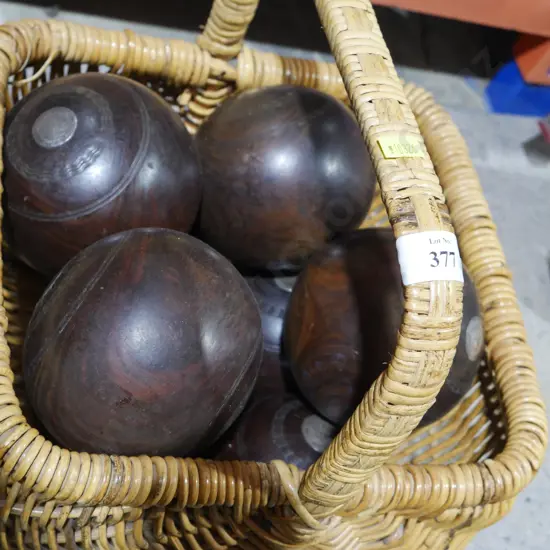 Cane basket and lawn bowls