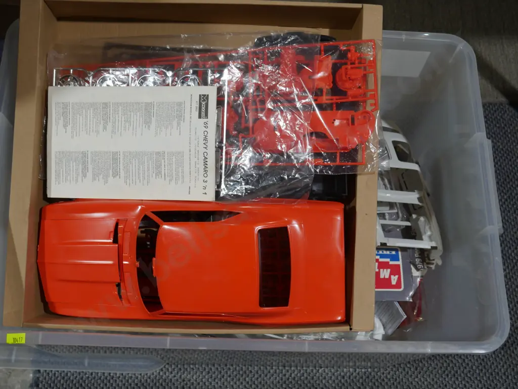 4 boxes of assorted model cars Image 1++