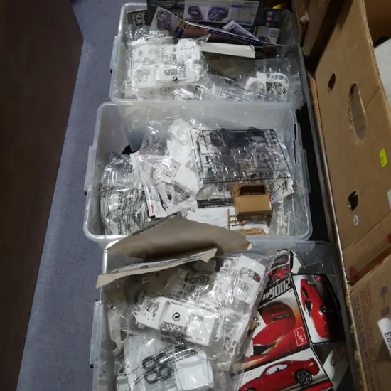 4 boxes of assorted model cars