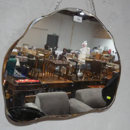 Frameless bevilled mirror