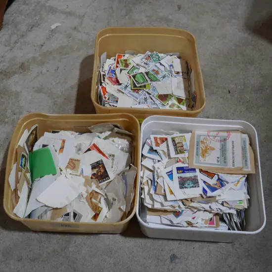 Three tubs of assorted stamps