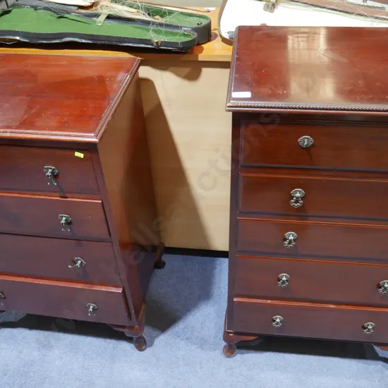 Two tall boy chests of drawers