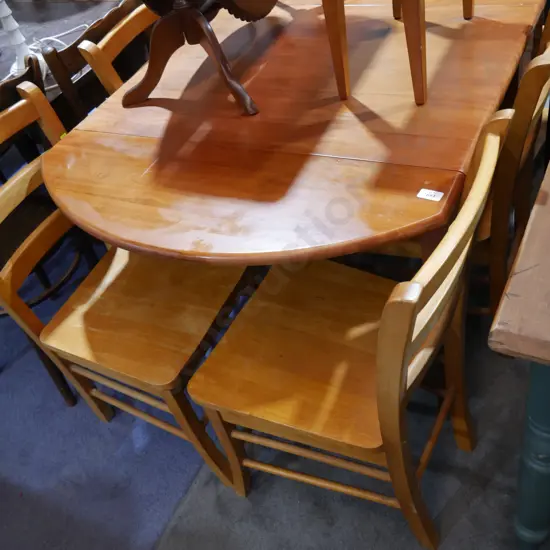 Drop end dining table and 4 chairs