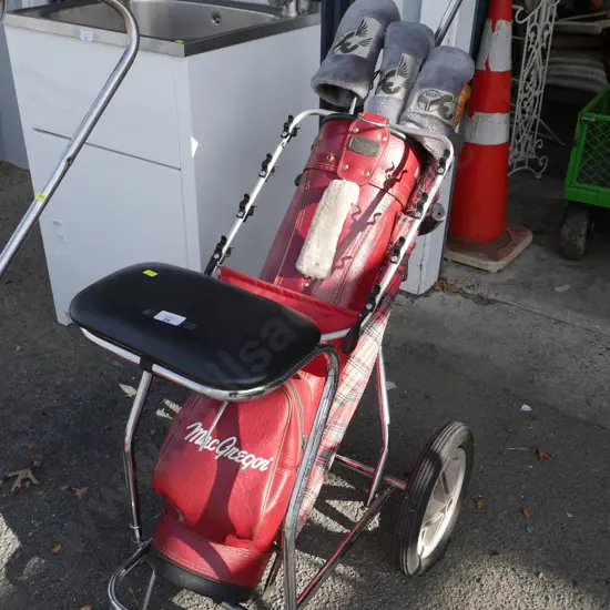 Golf trundler and clubs