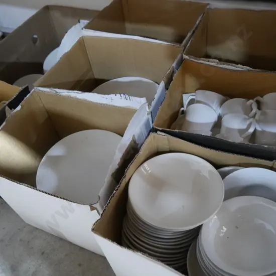 9 boxes of dinnerware