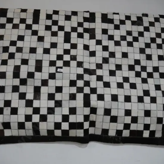 Chequered cow hide mat