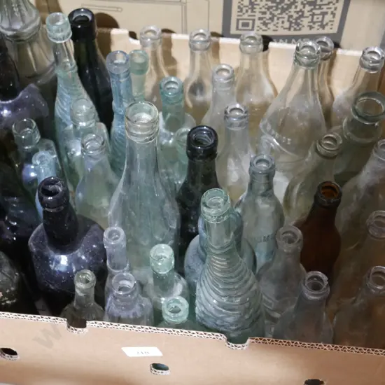Box of old glass bottles