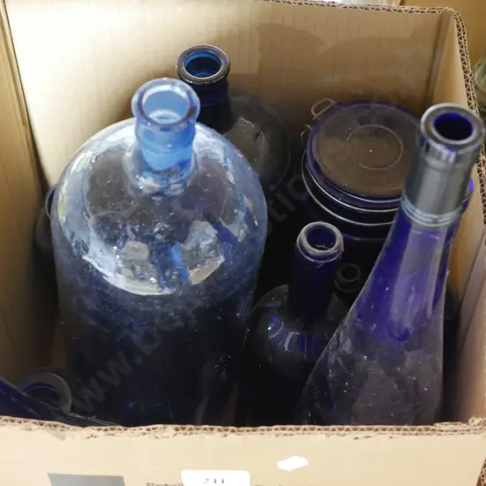 Box of blue glass bottles