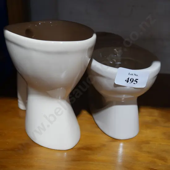 2 sample miniature toilets