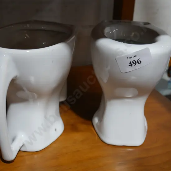 2 sample miniature toilets