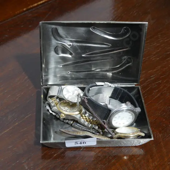 Watches in metal box